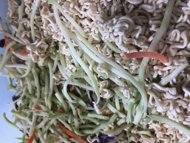 Bring this broccoli slaw ramen noodle salad to any summer cookout for an easy win. | broccoli slaw ramen noodle salad recipe | broccoli slaw salad | ramen noodle salad recipe #blessedsimplicity #acvrecipes #meatlessrecipe #summersalad